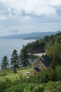 cottage-house-by-lakefront-morning-mist